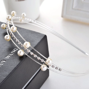 Elegant triple-layered pearl headband with sparkling rhinestones on a silver metal frame