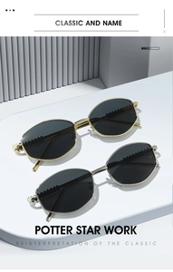 Detail of stylish oval metal sunglasses featuring unique wavy temple design and dark lenses