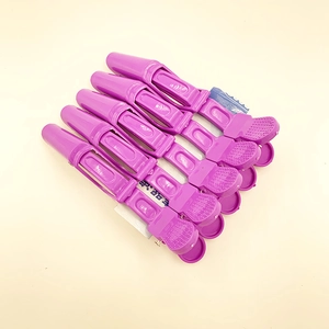 Set of 6 purple professional sectioning hair clips with anti-slip grip for styling