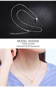 Detailed dolphin pendant necklace with smooth finish and adjustable snake chain detail