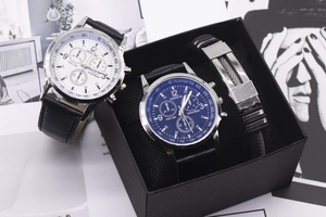 Detail of blue dial quartz watch and stainless steel bracelet set in a black gift box