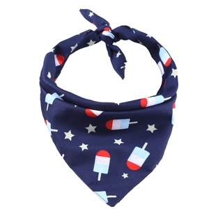 Detail of navy blue pet bandana with ice pop and white star patterns for Independence Day