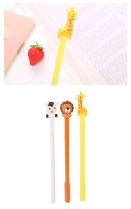 Close-up of cute animal silicone toppers on creative cartoon pens for school stationery
