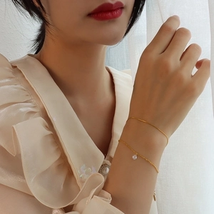 Double-layered 18k gold plated titanium steel bracelet with sparkling cubic zirconia