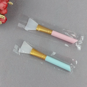Silicone face mask brush set with soft white tip, golden ferrule, pink and blue handles