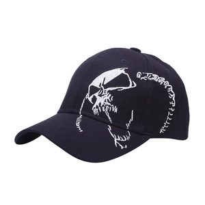 Dark blue cotton baseball cap with white skull embroidery and structured curved brim