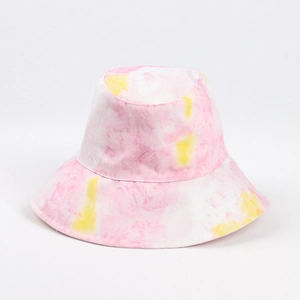 Detail view of pink and yellow tie-dye bucket hat with durable cotton fabric texture