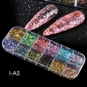 Macro view of 12-compartment nail art glitter box with assorted mixed shape sequins