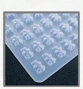 Close-up of translucent gummy bear silicone mold with multiple cavities for DIY resin craft