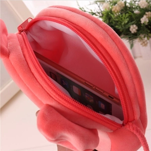 Cute pink plush shoulder bag for girls showing internal storage space with zipper