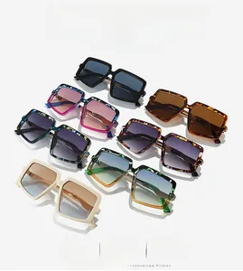 Detailed collection of seven chunky square oversized sunglasses in various colors and patterns