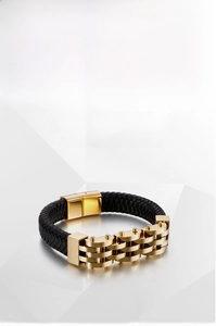 Detail of braided black leather bracelet with 316L gold stainless steel magnetic clasp