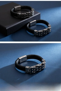 Detail showing braided leather men's bracelet with mechanical chain and magnetic buckle