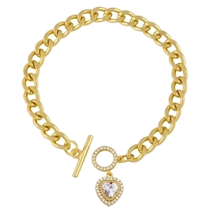 Bracelet chaîne gourmette dorée avec pendentif cœur et fermoir en T pour femme