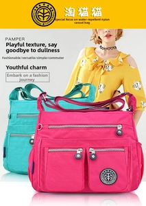 Close-up of waterproof nylon multi-pocket crossbody bag in rose red and teal colors