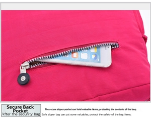 Detail view of pink nylon bag featuring a secure back zipper pocket for mobile phones