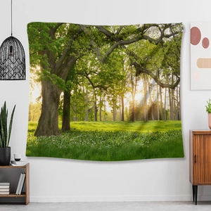 Detail of forest landscape tapestry hanging on a white wall in a cozy room setting