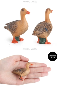Detailed realistic wild duck figurine model showing hand-held scale and textures