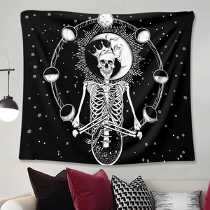 Bohemian black and white wall tapestry with skull moon and phase patterns