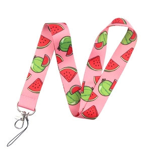 Close-up of pink lanyard featuring vibrant watermelon patterns with metal swivel hook