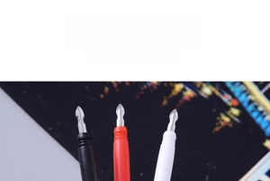 Macro detail of metal scratch pens with flat nibs for artistic colorful scratch paper art