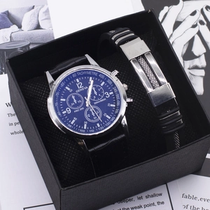 Men's blue dial quartz watch with black leather strap and matching bracelet in a gift box