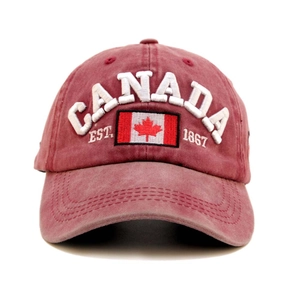 Detailed embroidery of Canada flag and EST 1867 text on washed cotton baseball cap