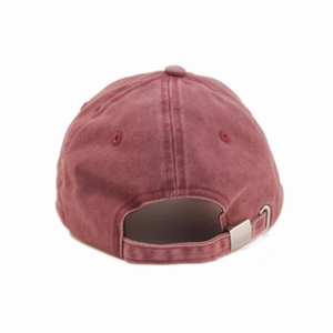 Detail view of washed cotton baseball cap with adjustable silver metal buckle and strap
