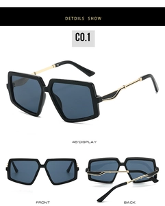 Detail view of square sunglasses with golden hollow temples and dark tinted lenses
