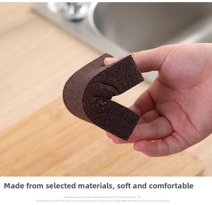 Flexible brown emery sponge detail showing softness for rust removal and kitchen cleaning