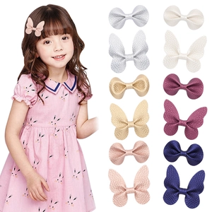 12-piece set of butterfly hair clips for girls with lychee texture in assorted colors