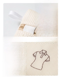Detail of thickened mesh laundry bag with embroidery icon and zipper protector
