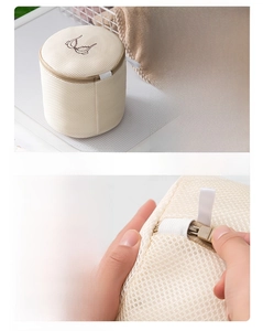 Detailed macro view of the 3D mesh bra laundry bag with hidden zipper and embroidery