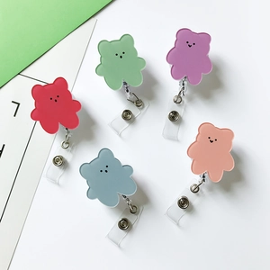 Detail of colorful acrylic bear retractable badge holders for nurses and students