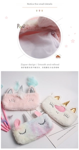 Detail of plush unicorn pencil case with smooth zipper and soft pastel rainbow fabric