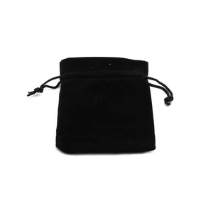 Close-up of a black velvet drawstring pouch for natural stone necklace storage