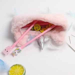 Pink plush unicorn pencil case with silver horn and storage space for stationery