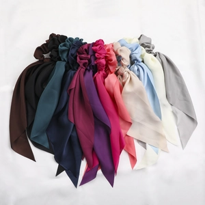 Silky satin ribbon scrunchies set in various elegant colors for stylish ponytail styling