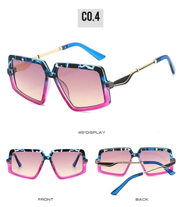 Detail view of square leopard print sunglasses with pink gradient lenses and metal legs