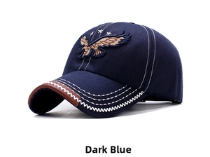 Detailed embroidery of eagle and star on dark blue baseball cap with leather brim trim