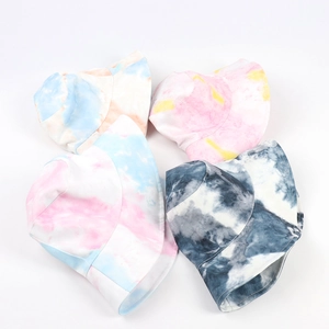 Colorful tie-dye bucket hats for men and women featuring vibrant hand-painted cotton fabric
