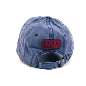 Rear view of washed navy baseball cap with vintage USA embroidery patch and adjustable buckle