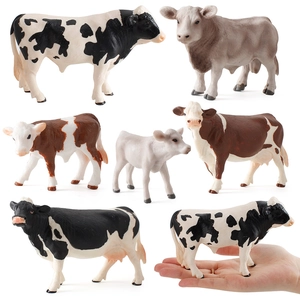 Educational set of 7 realistic Holstein and Jersey cow figurines for kids
