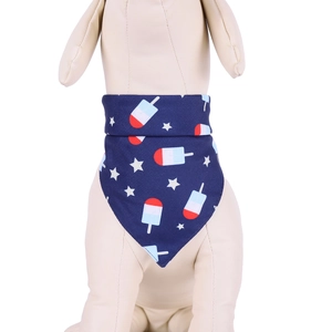 Detail of dog wearing a blue cotton bandana with stars and popsicles for Independence Day