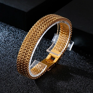 Polished gold stainless steel dragon bone chain bracelet for men displayed at 45 degree angle