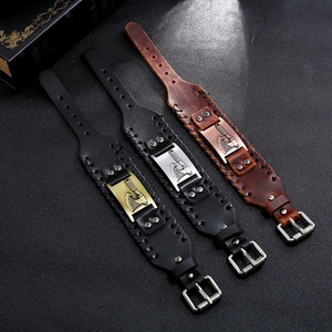Three vintage Viking axe leather bracelets in black and brown with braided punk details