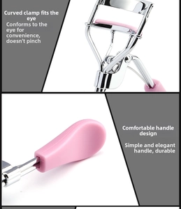 Detail view of the ergonomic handle and precision eyelash curler with pink silicone pad