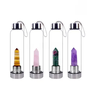 Detailed set of 550ml glass water bottles with natural quartz crystal points and steel lids