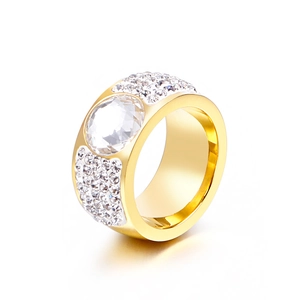 Gold plated wide band ring featuring a large round center stone and pave accents