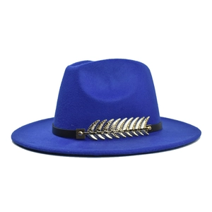 Close-up of royal blue wool fedora with black leather band and gold feather detail